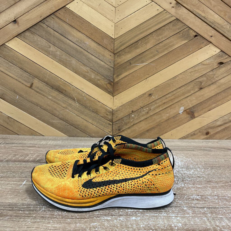 Nike- fly knit shoes- MSRP $ 170: orange -men-7.5